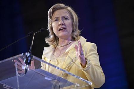 U.S. Secretary of State Hillary Clinton gestures during a speech at the launch of a Global Partnership for Girls' and Women's Education at U U.S. Secretary of State Hillary Clinton gestures during a speech at the launch of a Global Partnership for Girls' and Women's Education at U