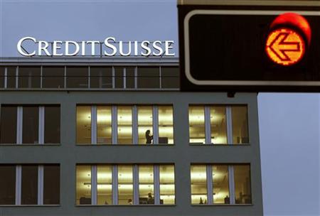 A traffic light is seen in front of an office building of Swiss bank Credit Suisse in Zurich A traffic light is seen in front of an office building of Swiss bank Credit Suisse in Zurich