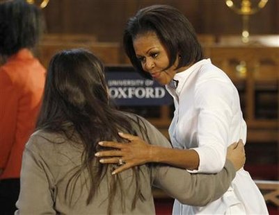 U.S. first lady Obama talks with a student from the Elizabeth Garrett Anderson School at Oxford University in Oxford U.S. first lady Obama talks with a student from the Elizabeth Garrett Anderson School at Oxford University in Oxford