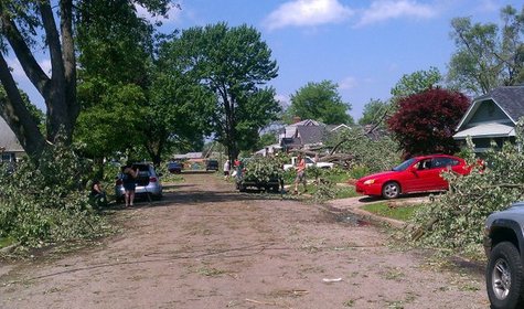 Residents clean up just off Columbia and Highland in Battle Creek. The region was hit with severe weather Sunday May 29th, 2011, knocking out power and disrupting travel. Residents clean up just off Columbia and Highland in Battle Creek. The region was hit with severe weather Sunday May 29th, 2011, knocking out power and disrupting travel.