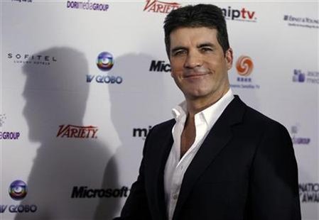 Producer and television star Simon Cowell arrives at the 38th International Emmy Awards in New York City
