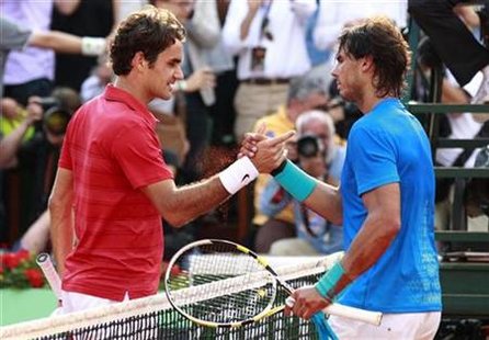 Nadal of Spain shakes hands with Federer of Switzerland after winning their men's final at the French Open tennis tournament at the Roland G Nadal of Spain shakes hands with Federer of Switzerland after winning their men's final at the French Open tennis tournament at the Roland G
