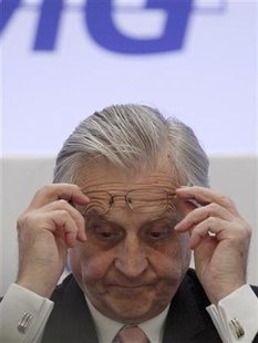 ECB Governor Trichet adjusts his glasses during a conference in Madrid on reforms of the financial system ECB Governor Trichet adjusts his glasses during a conference in Madrid on reforms of the financial system