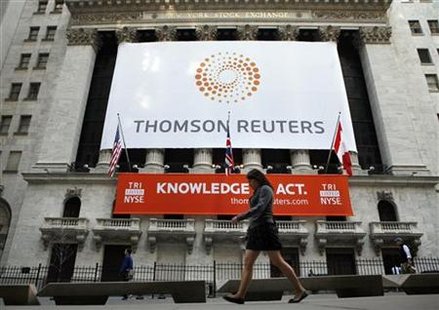The front of The New York Stock Exchange displays the new Thomson Reuters logo as the stock is traded for the first time in New York