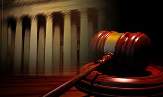 Gavel with courthouse in background graphic Gavel with courthouse in background graphic