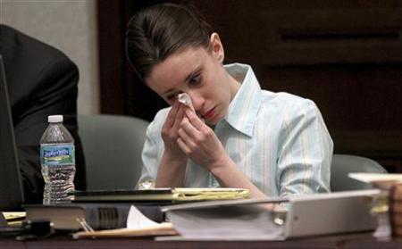 Casey Anthony wipes away tears at the start of the third day of her first degree murder trial at the Orange County Courthouse in Orlando