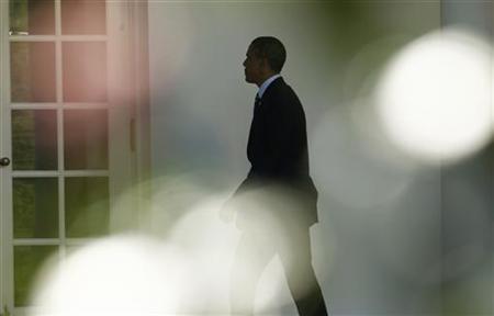 Obama walks to the Oval Office in Washington Obama walks to the Oval Office in Washington