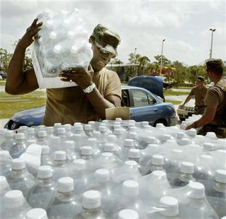 Natonal Guard hands out water in Sebastian to Hurricane victims. Natonal Guard hands out water in Sebastian to Hurricane victims.