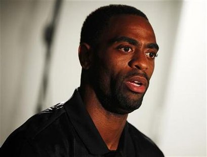 Sprinter Tyson Gay speaks during an interview in New York Sprinter Tyson Gay speaks during an interview in New York