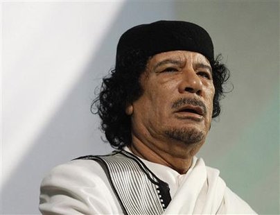 File photo shows Libyan leader Gaddafi speaking in Rome