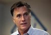 U.S. Republican presidential candidate Mitt Romney talks to supporters during a visit to Bizdom U in Detroit, Michigan