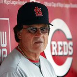 St. Louis Cardinals manager Tony La Russa watches his team's play from the dugout during the first inning of play against the Cincinnati Red St. Louis Cardinals manager Tony La Russa watches his team's play from the dugout during the first inning of play against the Cincinnati Red