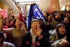 Protestors yell outside of the office of Wisconsin State Governor Scott Walker after the signing of the ceremonial bill, after the Republican-controlled House and Senate eliminated almost all collective bargaining for most public workers, at the state Capitol in Madison, Wisconsin March 11, 2011. REUTERS/Darren Hauck