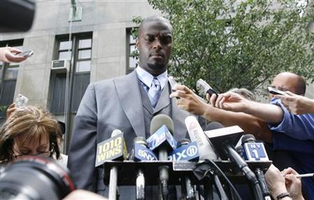 Former NFL player Plaxico Burress gives a statement outside of Manhattan criminal court after testifying before a grand jury in New York Former NFL player Plaxico Burress gives a statement outside of Manhattan criminal court after testifying before a grand jury in New York