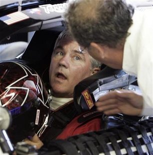 NASCAR champion Labonte is given instructions as he test drives Circuit Gilles Villeneuve in Montreal NASCAR champion Labonte is given instructions as he test drives Circuit Gilles Villeneuve in Montreal
