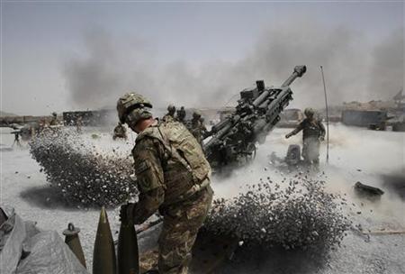 U.S. Army soldiers from the 2nd Platoon, B battery 2-8 field artillery, fire a howitzer artillery piece at Seprwan Ghar forward fire base in U.S. Army soldiers from the 2nd Platoon, B battery 2-8 field artillery, fire a howitzer artillery piece at Seprwan Ghar forward fire base in
