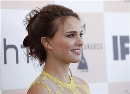 Natalie Portman of '"Black Swan" poses for photographs during arrivals at the 2011 Film Independent Spirit Awards in Santa Monica Natalie Portman of '"Black Swan" poses for photographs during arrivals at the 2011 Film Independent Spirit Awards in Santa Monica
