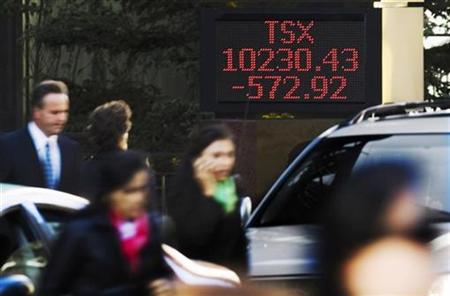 A sign displays TSX information in Toronto A sign displays TSX information in Toronto