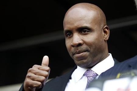 Former San Francisco Giants baseball player Bonds gestures to media outside Phillip Burton Federal Building in San Francisco