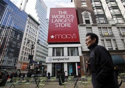 A man walks past the Macy's flagship department store in Herald Square in New York