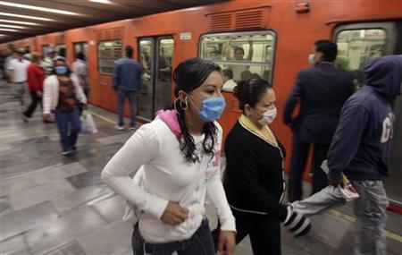 Passengers wear protective masks at Mexico's city subway Passengers wear protective masks at Mexico's city subway