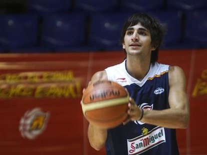 Spain's basketball player Ricky Rubio prepares to shoot during Spain's national team practice session in Madrid, August 12, 2010. Spain's basketball player Ricky Rubio prepares to shoot during Spain's national team practice session in Madrid, August 12, 2010.