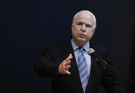 Senator John McCain talks to reporters during a news conference at the American Centre in Yangon Senator John McCain talks to reporters during a news conference at the American Centre in Yangon