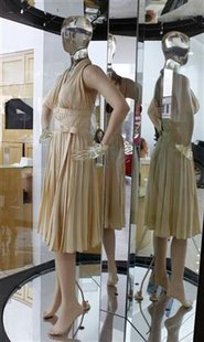 The ivory-pleated Subway dress worn by actress Marilyn Monroe from the 1955 film The Seven Year Itch The ivory-pleated Subway dress worn by actress Marilyn Monroe from the 1955 film The Seven Year Itch