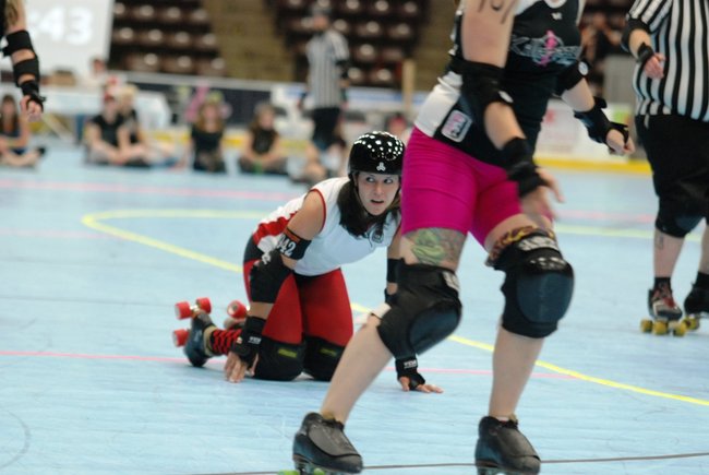 The Killamazoo Derby Darlins take on the Naptown Warning Belles at Wings Stadium 06/18/11.  Photos by Sean Patrick Duross.