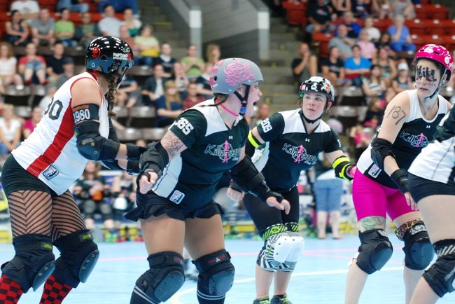 The Killamazoo Derby Darlins take on the Naptown Warning Belles at Wings Stadium 06/18/11.  Photos by Sean Patrick Duross.