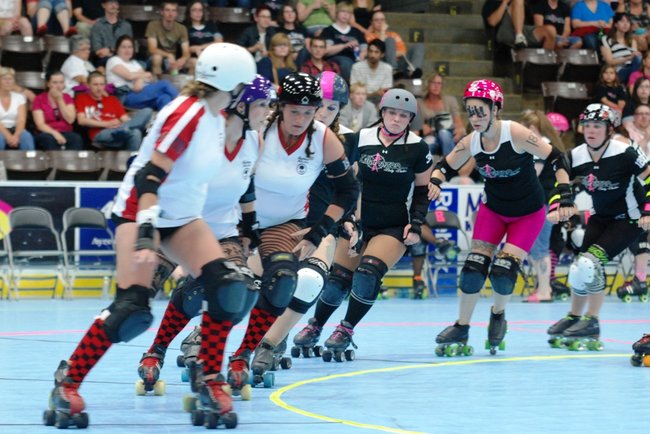 The Killamazoo Derby Darlins take on the Naptown Warning Belles at Wings Stadium 06/18/11.  Photos by Sean Patrick Duross.