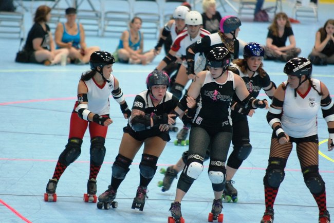The Killamazoo Derby Darlins take on the Naptown Warning Belles at Wings Stadium 06/18/11.  Photos by Sean Patrick Duross.