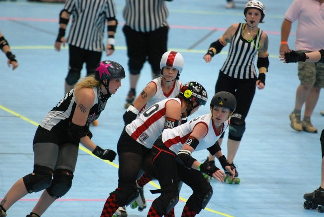 The Killamazoo Derby Darlins take on the Naptown Warning Belles at Wings Stadium 06/18/11.  Photos by Sean Patrick Duross.
