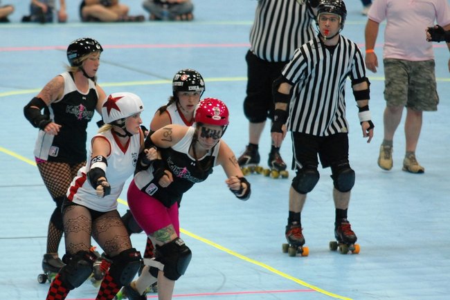 The Killamazoo Derby Darlins take on the Naptown Warning Belles at Wings Stadium 06/18/11.  Photos by Sean Patrick Duross.