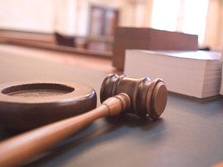 Judge's Gavel In The Courtroom