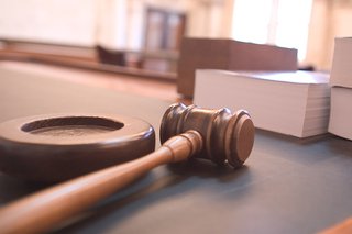 Judge's Gavel In The Courtroom