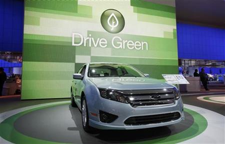 The 2010 Ford Fusion is seen in front of a sign that reads "Drive Green" at the 2010 North American International Auto Show during press day The 2010 Ford Fusion is seen in front of a sign that reads "Drive Green" at the 2010 North American International Auto Show during press day