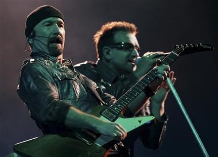 Irish singer Bono and guitarist The Edge perform with his band U2 during their show at Morumbi stadium in Sao Paulo Irish singer Bono and guitarist The Edge perform with his band U2 during their show at Morumbi stadium in Sao Paulo