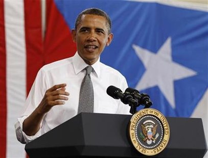President Barack Obama speaks inside hanger at Luis Munoz Marin International Airport in Puerto Rico President Barack Obama speaks inside hanger at Luis Munoz Marin International Airport in Puerto Rico