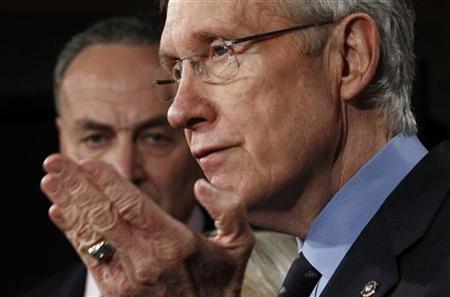 U.S. Senate Majority leader Reid makes remarks as Senator Schumer listens during a news conference on Capitol Hill in Washington U.S. Senate Majority leader Reid makes remarks as Senator Schumer listens during a news conference on Capitol Hill in Washington