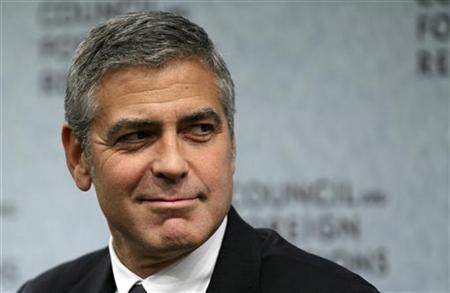 George Clooney listens to opening remarks in Washington George Clooney listens to opening remarks in Washington