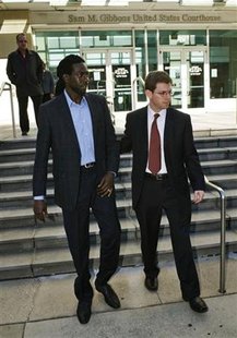 Grammy award winner Buju Banton leaves the federal courthouse with attorney Markus in Tampa Grammy award winner Buju Banton leaves the federal courthouse with attorney Markus in Tampa