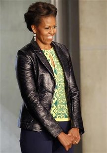 First lady Michelle Obama looks on during a visit to Cape Town stadium, First lady Michelle Obama looks on during a visit to Cape Town stadium,