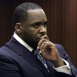 Former Detroit Mayor Kilpatrick listens to Judge David Groner during his sentencing hearing where he received 120 days in jail in Michigan