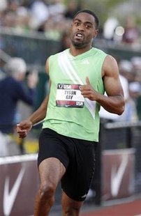 Tyson Gay finishes the men's 100 meters heat at the U.S. Outdoor Track and Field Championships in Eugene Tyson Gay finishes the men's 100 meters heat at the U.S. Outdoor Track and Field Championships in Eugene