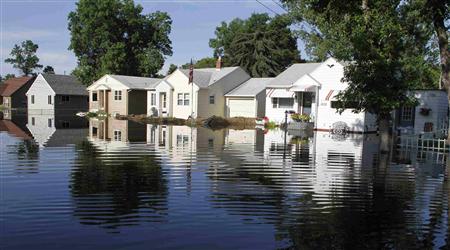 Homes are reflected in flood waters at Minot Homes are reflected in flood waters at Minot