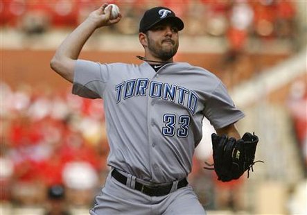 Toronto Blue Jays starting pitcher Carlos Villanueva delivers a pitch to a St. Louis Cardinals during the first inning of their Interleague Toronto Blue Jays starting pitcher Carlos Villanueva delivers a pitch to a St. Louis Cardinals during the first inning of their Interleague