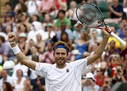 Mardy Fish of the U.S. celebrates after defeating Tomas Berdych of the Czech Republic at the Wimbledon tennis championships in London Mardy Fish of the U.S. celebrates after defeating Tomas Berdych of the Czech Republic at the Wimbledon tennis championships in London