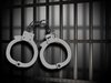 jail bars and cuffs