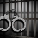 jail bars and cuffs jail bars and cuffs